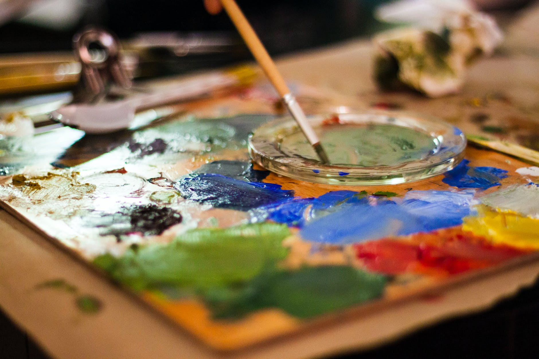 Close up of a paint palette and brush